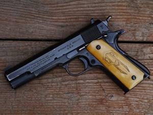 Картинки Пистолет Вблизи М1911 автомобиль