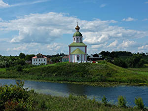 Обои для рабочего стола Россия Река Церковь Холмы Suzdal Vladimir Oblast Города