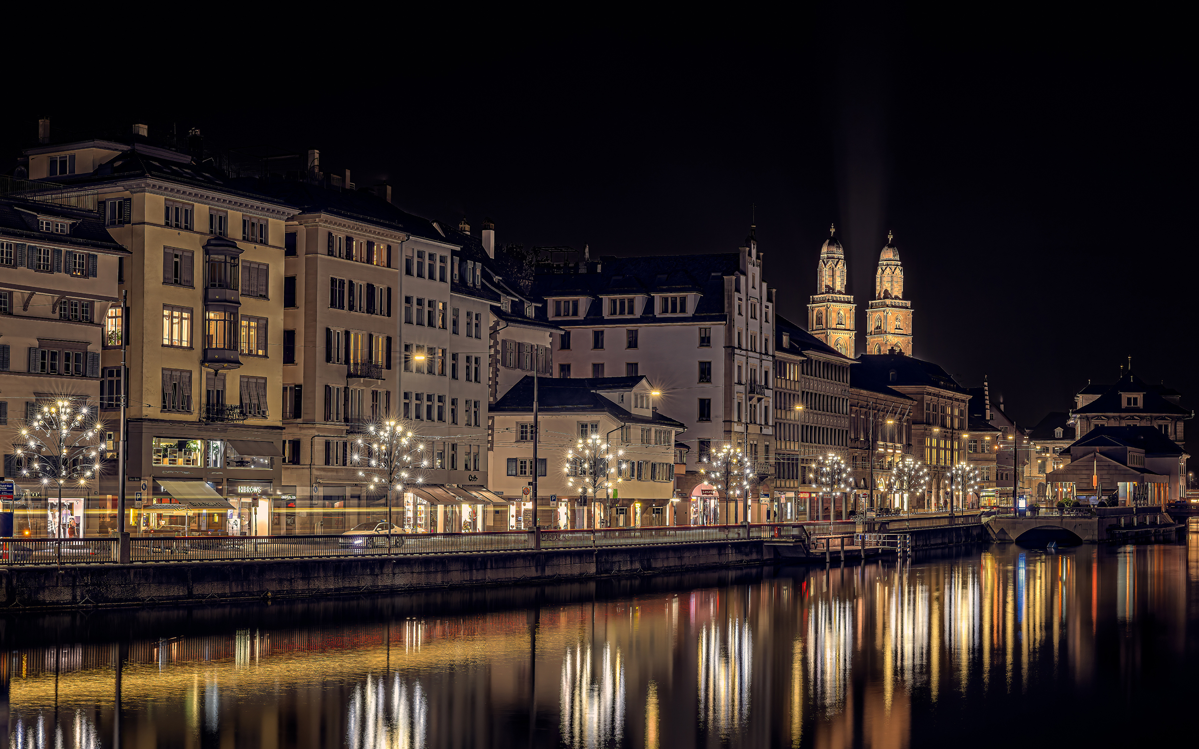 Фото Цюрих Рождество Швейцария улице Реки ночью Электрическая гирлянда Дома Города 3840x2400 Новый год улиц Улица река Ночь речка в ночи Ночные Гирлянда город Здания