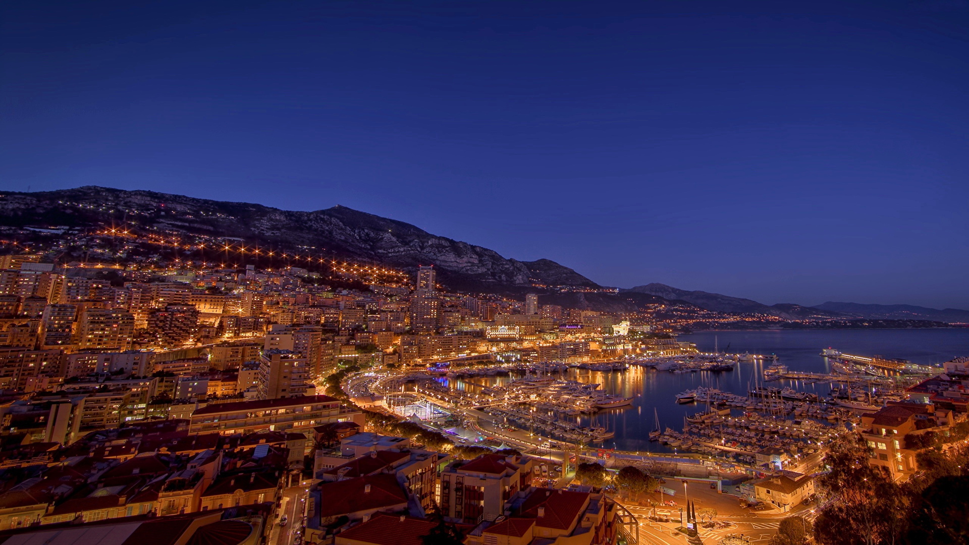 Фото Монако Ночь Причалы город Здания 1920x1080 Пирсы ночью в ночи Ночные Пристань Дома Города