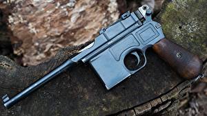 Фотография Пистолеты Крупным планом 1918 Mauser C96 Автомобили