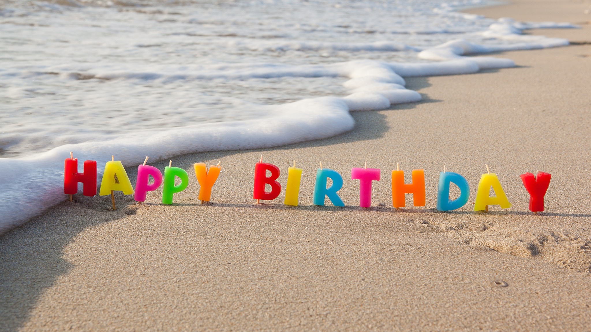 Birthday_Candles_Coast_Waves_Sand_546096_2048x1152.jpg