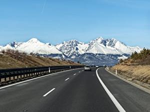 Обои для рабочего стола Словакия Гора Дороги Снега Асфальт Tatra mountains Природа