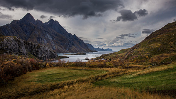 Фотографии Лофотенские острова Норвегия Горы Природа Пейзаж облако 600x337 гора Облака облачно