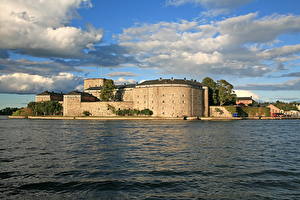 Фото Замок Швеция Небо Речка Облака Vaxholm