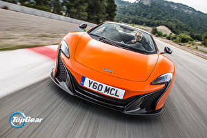 Картинка Макларен Спереди Оранжевая Едущая 650S Spider