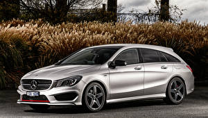 Картинки Mercedes-Benz Серебристый 2015 CLA 250 Sport 4MATIC Shooting Brake AU-spec X117 машина