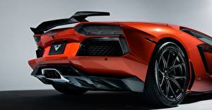 Картинки Ламборгини Роскошные Оранжевые Колесо Вид сзади 2015 lp-700-4 aventador Автомобили