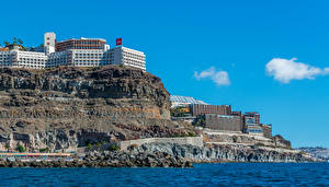 Картинка Испания Дома Море Канарские острова Скале Puerto Rico Gran Canaria Города