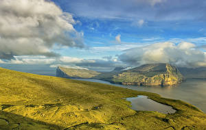 Фотографии Пейзаж Дания Берег Остров Небо Облака Klaksvik Faroe Islands Природа