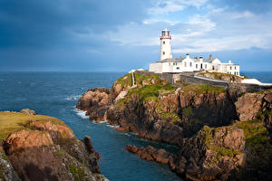 Обои Ирландия Маяки Море Утес Fanad Head Lighthouse Природа